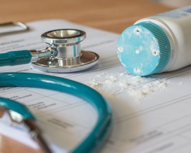 Statoscope and powder bottle