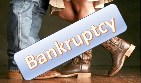 Bankruptcy text over cowboy boots