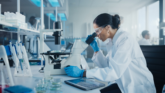 medical researcher reviewing cancer research in a laboratory