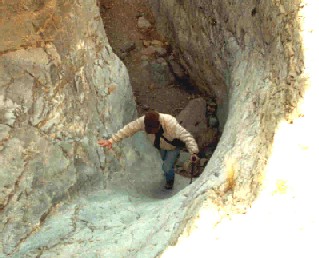 Jack Holmes studying rock art