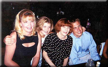 Judith Koranda (c), her daughter Carolyn (l) and two of her 11 grandchildren