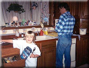 Taylor helping Chris with the dishes